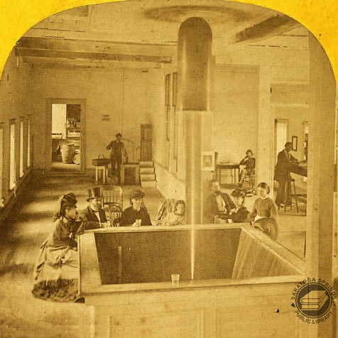 Photograph of Geyser Spring House interior from a stereo view card